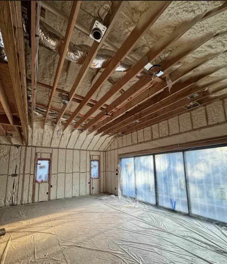 Interior walls and ceiling insulated with spray foam during new construction in Bacliff
